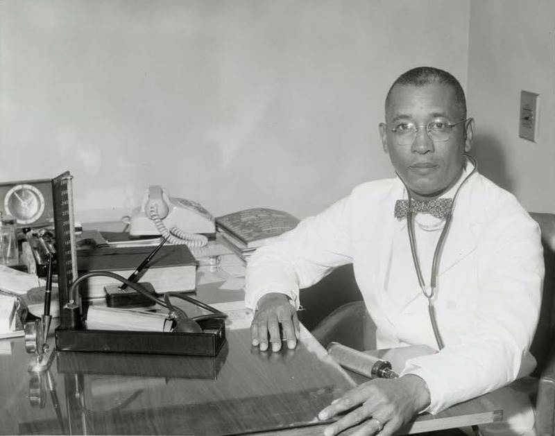 African-American at a desk working in early 1900's