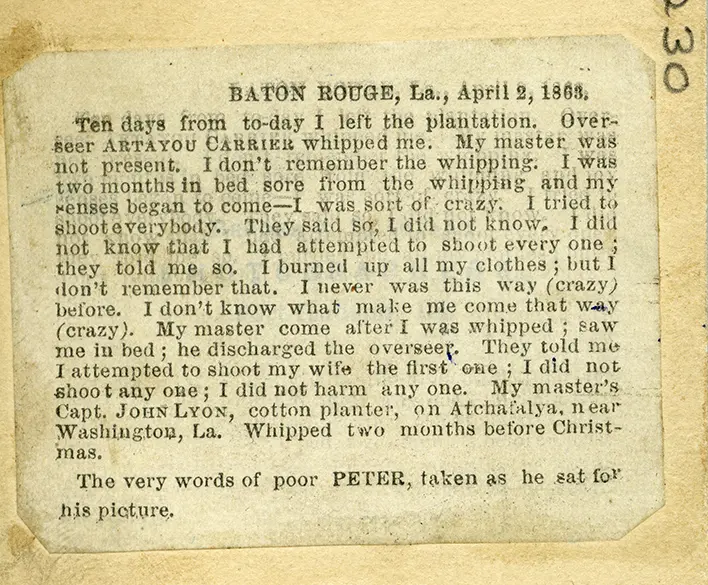 A block of text from the back of a photograph showing a former slave named Peter.